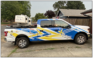 Profile shot of the Miles Security work truck